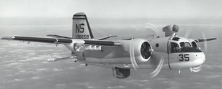 A Grumman S-2A Tracker of anti-submarine squadron VS-29 Tromboners. Note the spotlight on the right wing. (US Navy)
